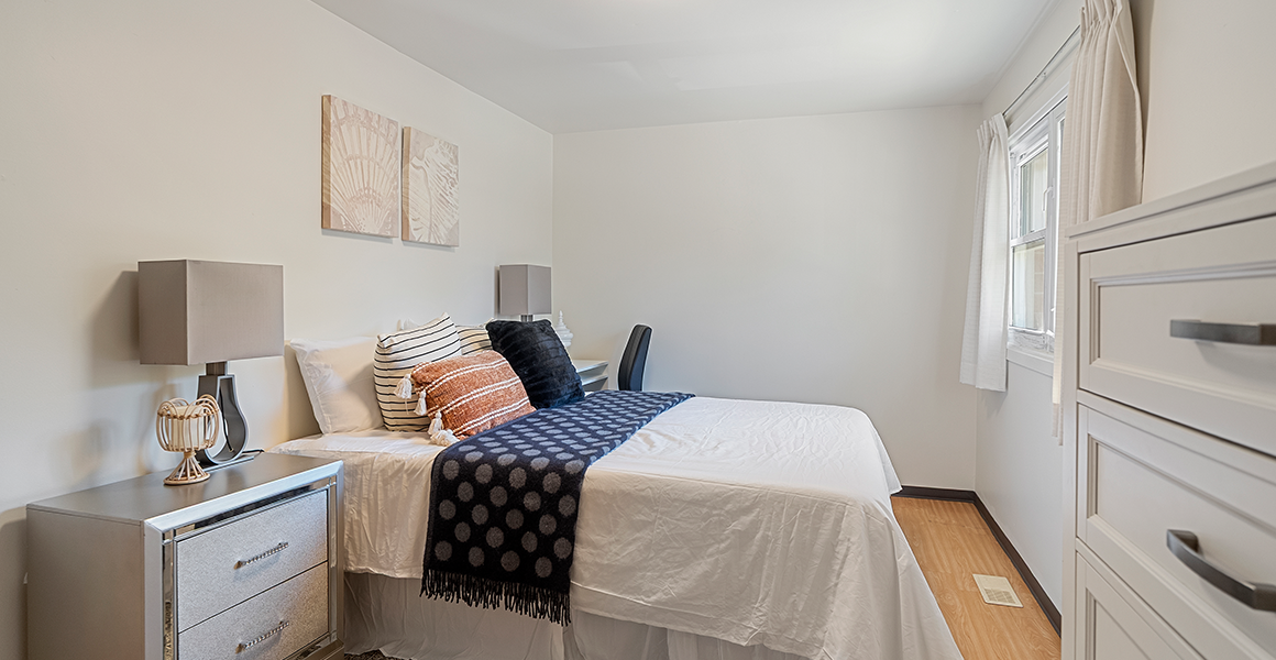 Bedroom showing bed and two side tables
