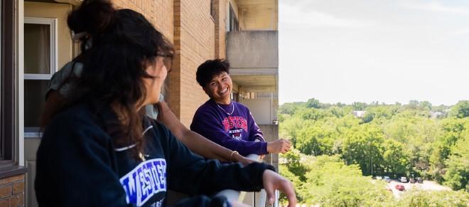 Three students on the balcony